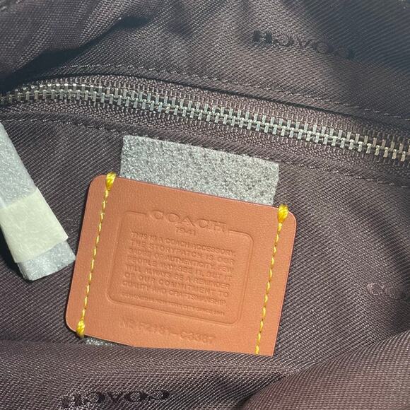 NWOT Coach 1941 Turnlock Pouch 26 with Horse and Carriage Jacquard Black C3387 - Picture 8 of 8